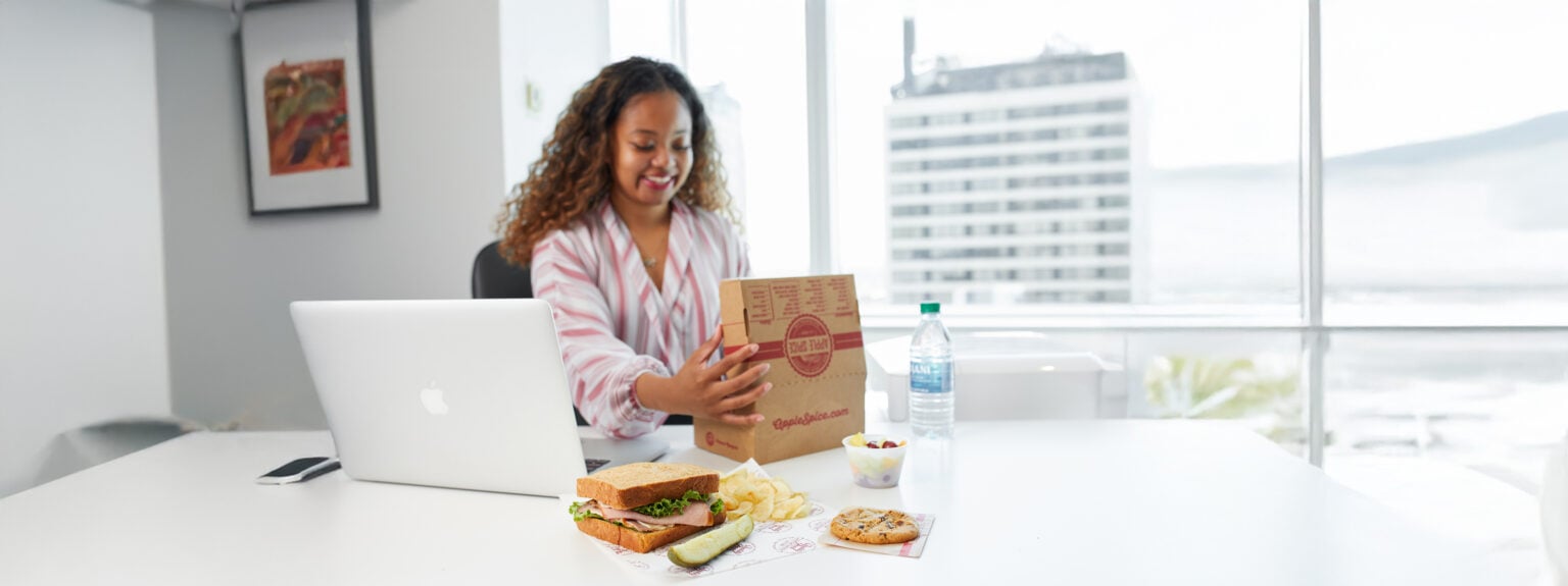 Woman unpacking Apple Spice lunch